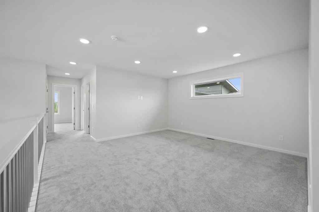 MLS® A2249894 - 104 Emerald Drive  in Evergreen Red Deer, Residential