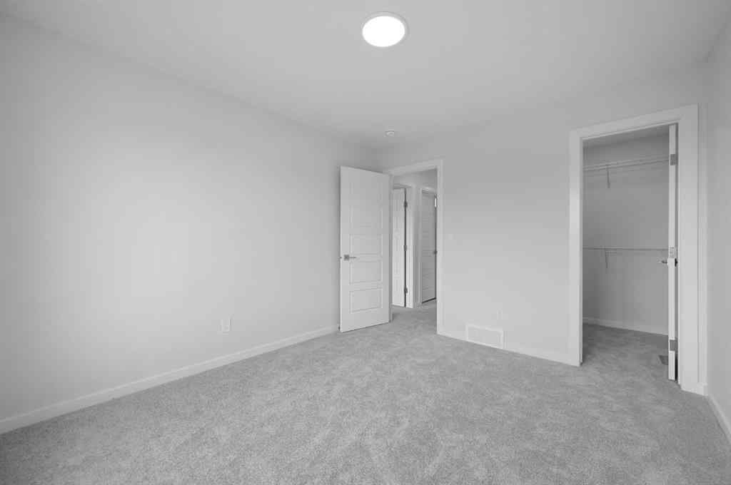 MLS® A2249894 - 104 Emerald Drive  in Evergreen Red Deer, Residential