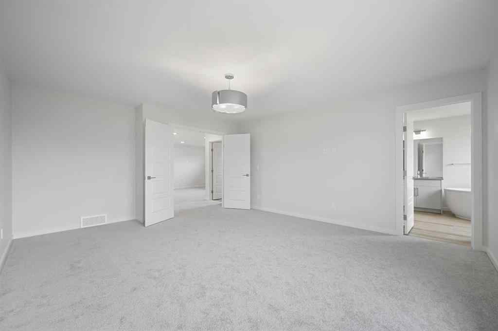 MLS® A2249894 - 104 Emerald Drive  in Evergreen Red Deer, Residential