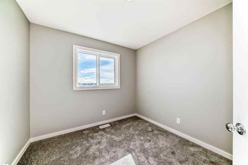 MLS® A2249929 - 64 Bartlett Way SE in Rangeview Calgary, Residential