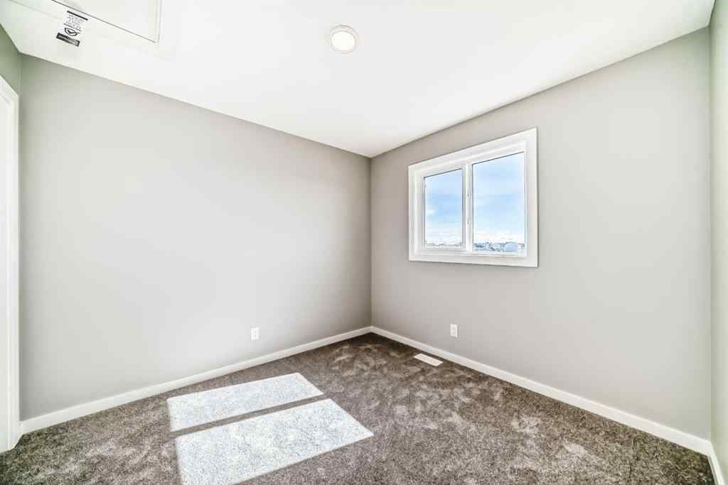 MLS® A2249929 - 64 Bartlett Way SE in Rangeview Calgary, Residential