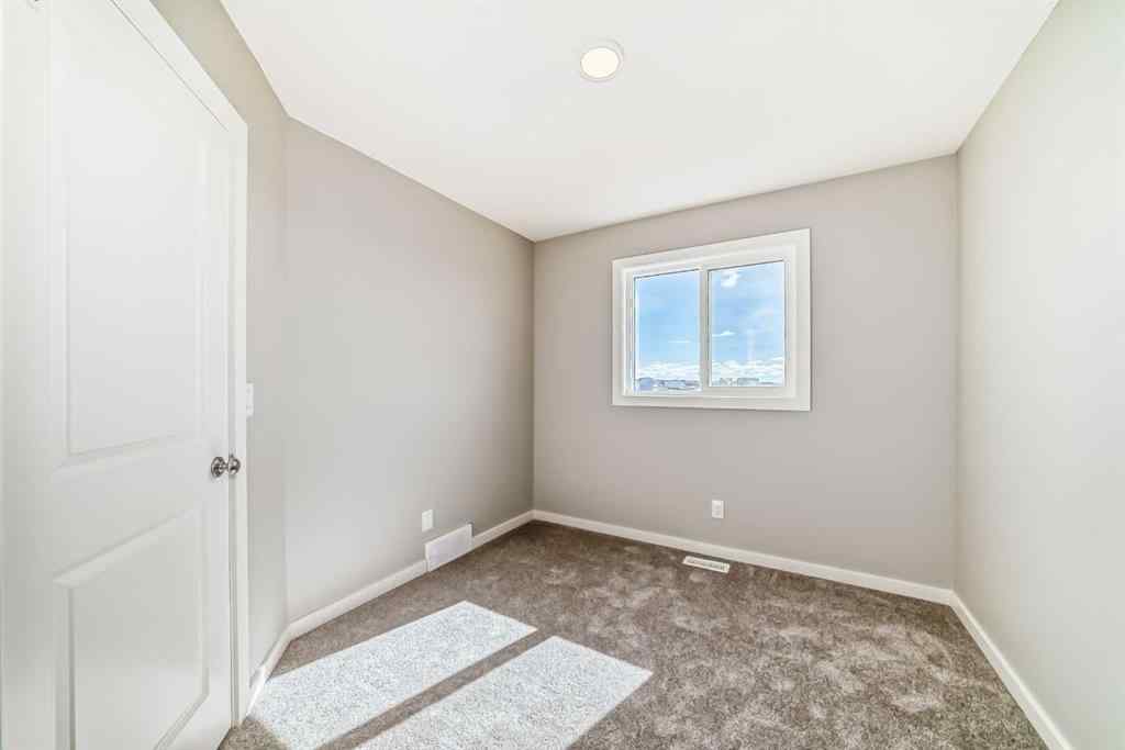MLS® A2249929 - 64 Bartlett Way SE in Rangeview Calgary, Residential