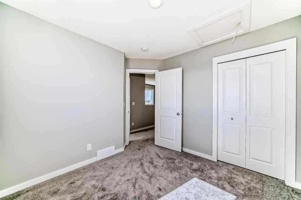 MLS® A2249929 - 64 Bartlett Way SE in Rangeview Calgary, Residential
