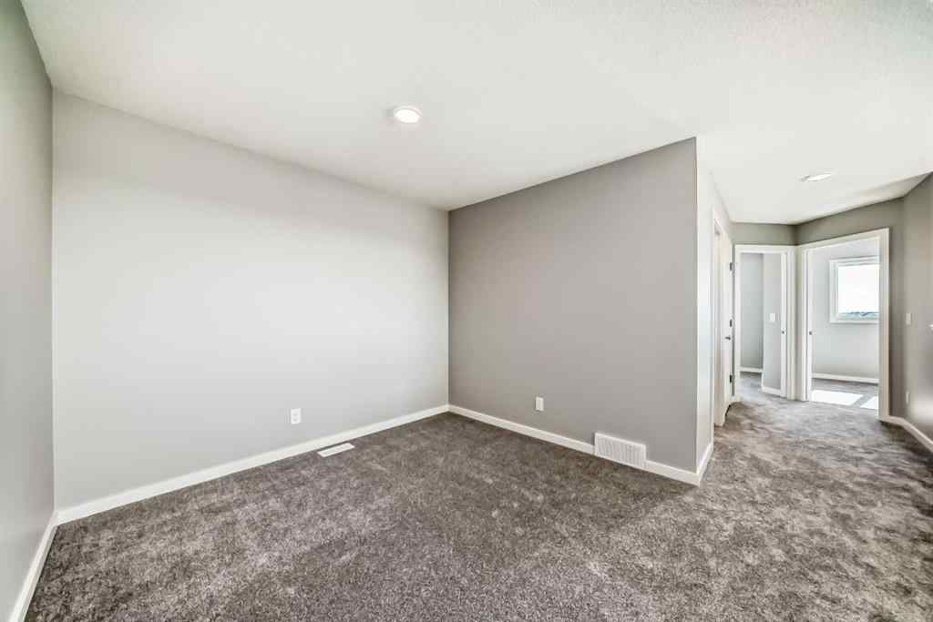 MLS® A2249929 - 64 Bartlett Way SE in Rangeview Calgary, Residential