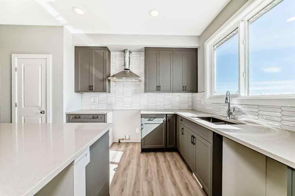 MLS® A2249929 - 64 Bartlett Way SE in Rangeview Calgary, Residential