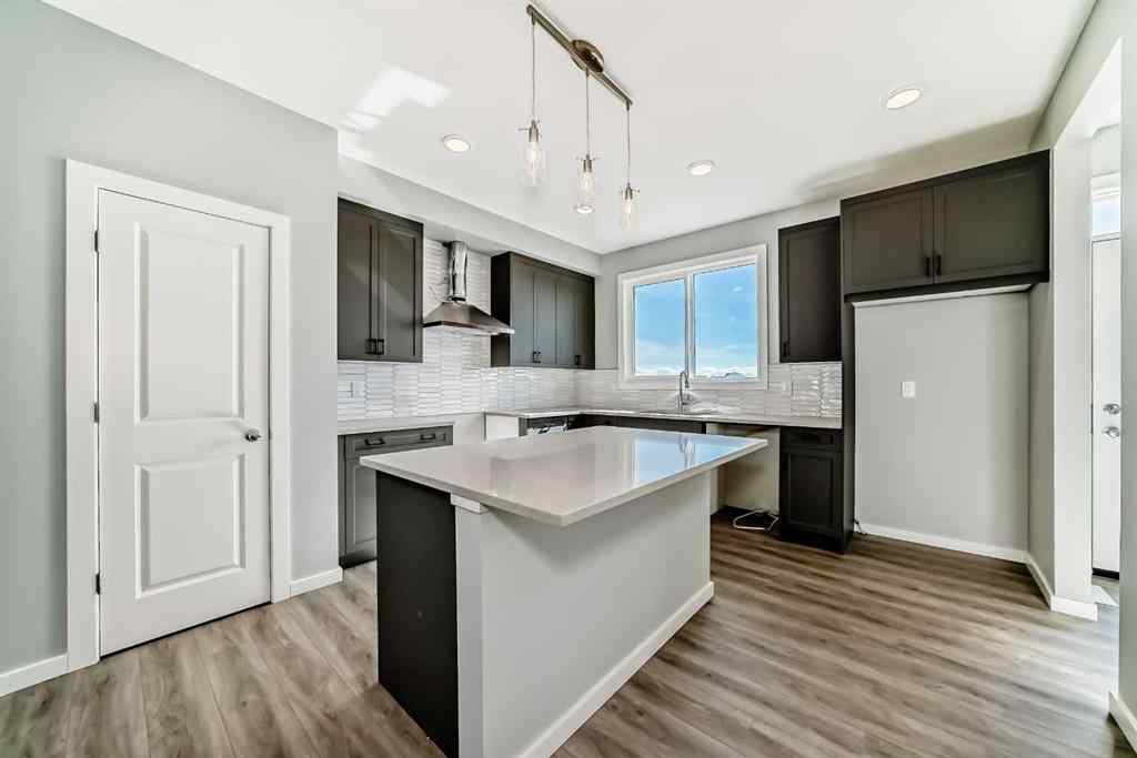 MLS® A2249929 - 64 Bartlett Way SE in Rangeview Calgary, Residential