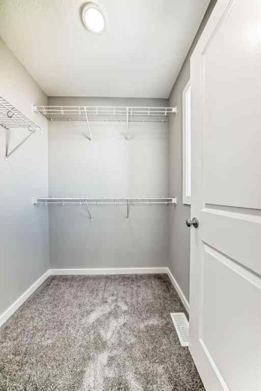 MLS® A2249929 - 64 Bartlett Way SE in Rangeview Calgary, Residential
