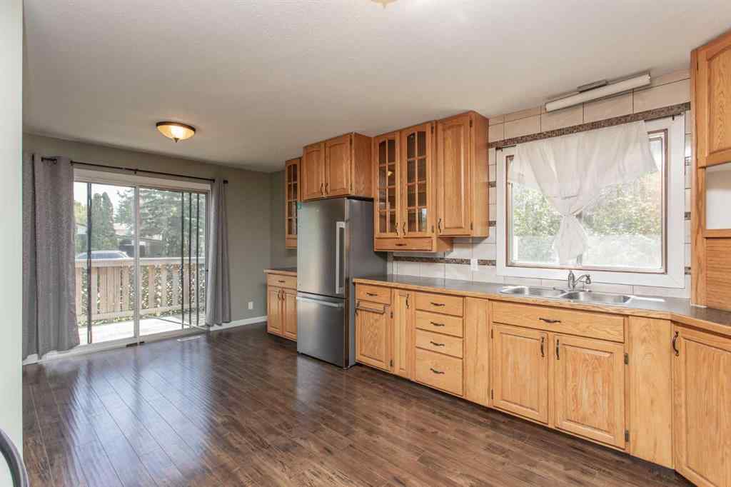 MLS® A2249968 - 6308 61 Avenue  in Highland Green Red Deer, Residential