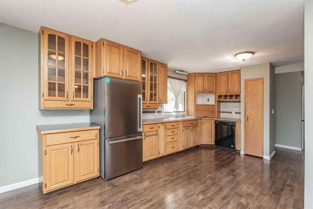 MLS® A2249968 - 6308 61 Avenue  in Highland Green Red Deer, Residential