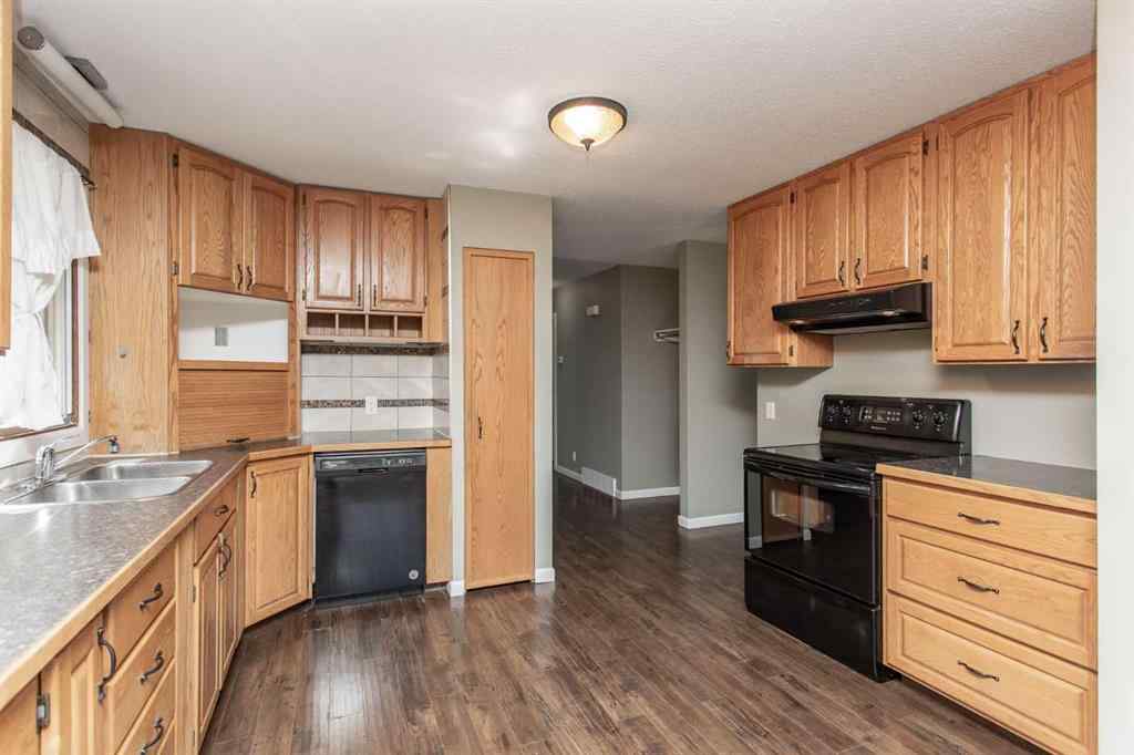 MLS® A2249968 - 6308 61 Avenue  in Highland Green Red Deer, Residential