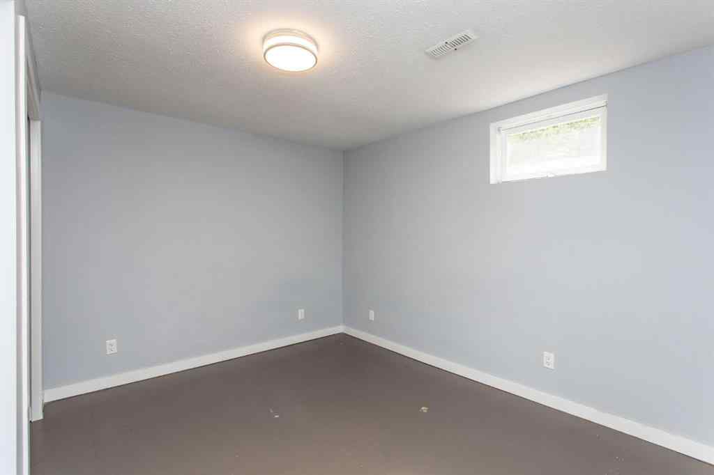 MLS® A2249968 - 6308 61 Avenue  in Highland Green Red Deer, Residential