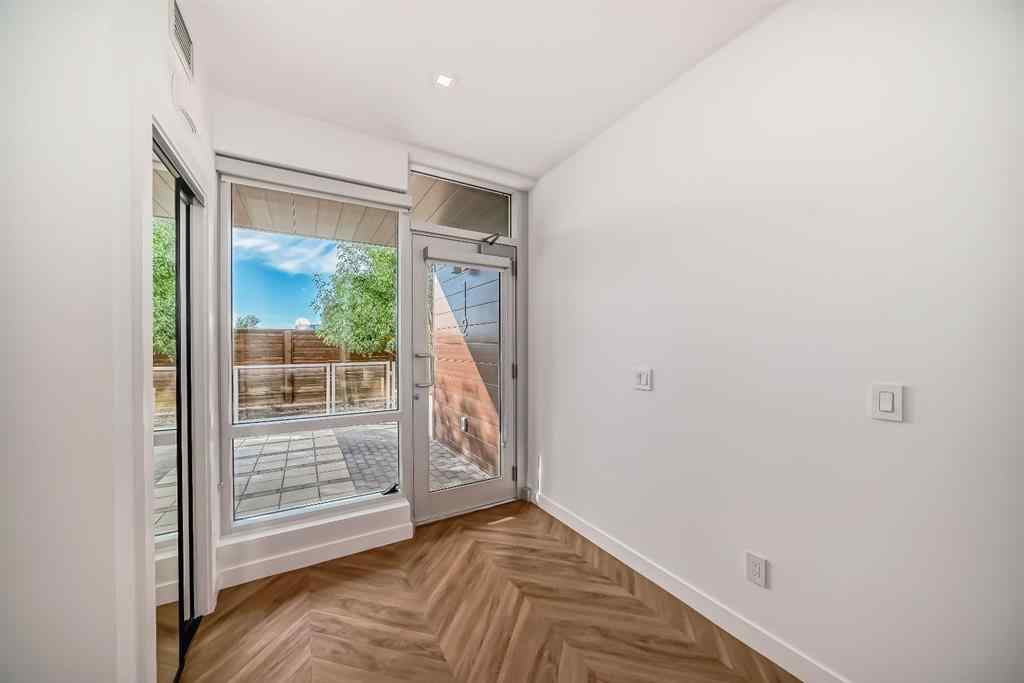 MLS® A2249976 - Unit #112 8445 Broadcast Avenue SW in West Springs Calgary, Residential