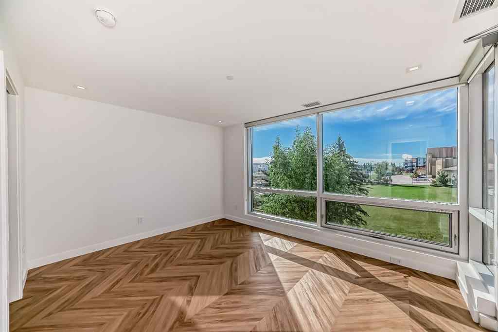MLS® A2249976 - Unit #112 8445 Broadcast Avenue SW in West Springs Calgary, Residential