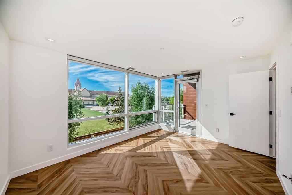 MLS® A2249976 - Unit #112 8445 Broadcast Avenue SW in West Springs Calgary, Residential