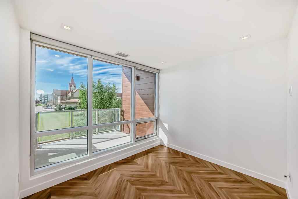 MLS® A2249976 - Unit #112 8445 Broadcast Avenue SW in West Springs Calgary, Residential