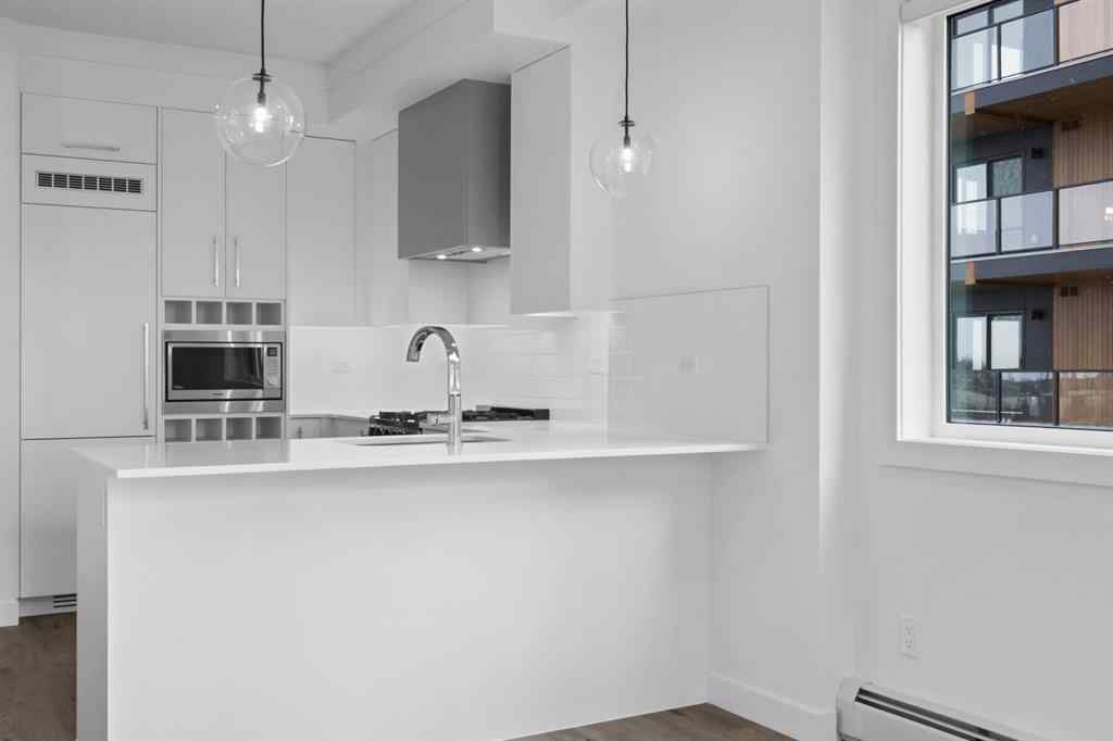 MLS® A2249981 - Unit #402 8370 Broadcast Avenue SW in West Springs Calgary, Residential