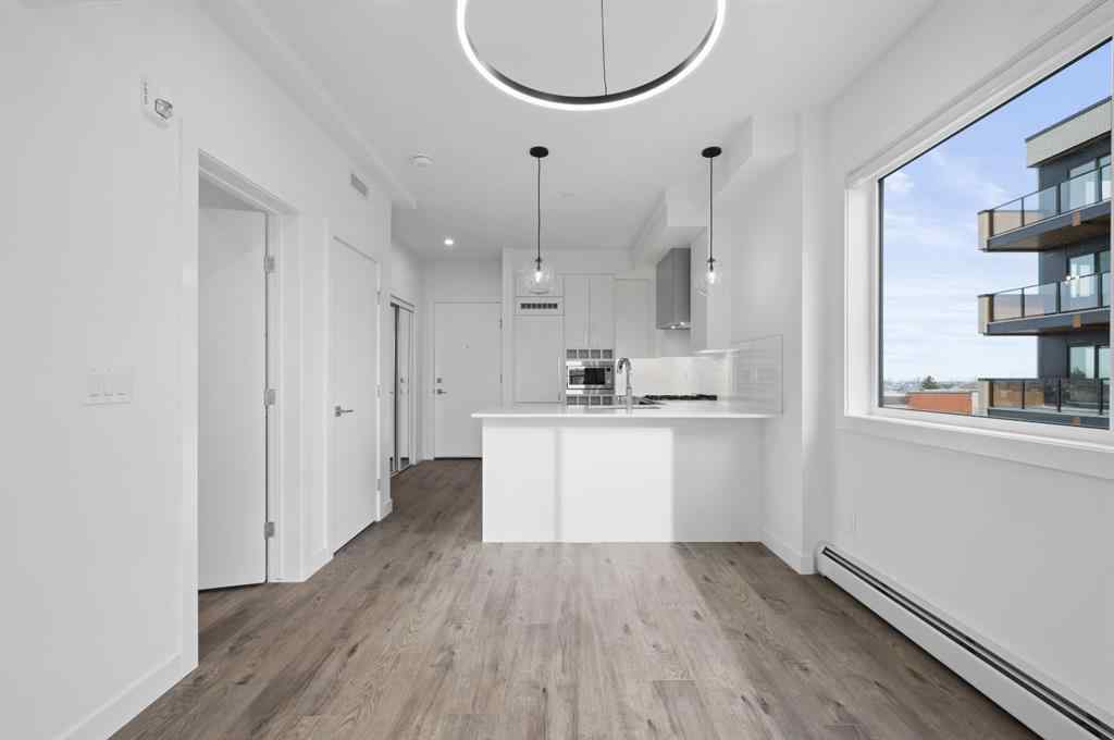 MLS® A2249981 - Unit #402 8370 Broadcast Avenue SW in West Springs Calgary, Residential