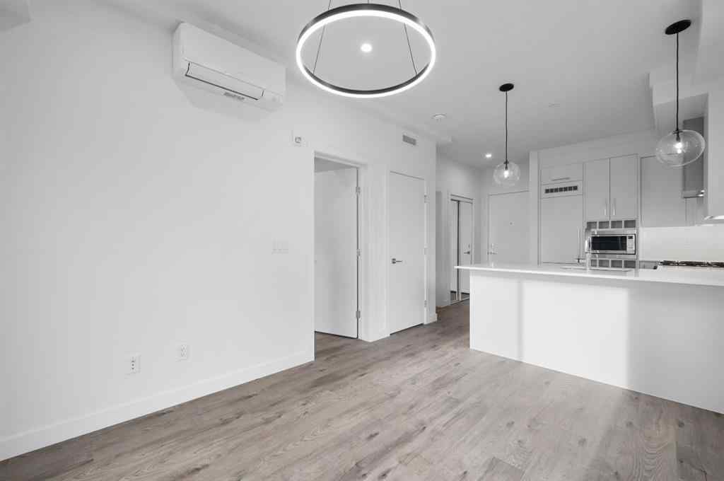 MLS® A2249981 - Unit #402 8370 Broadcast Avenue SW in West Springs Calgary, Residential