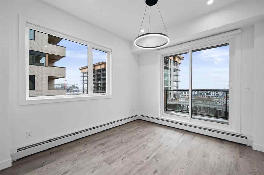 MLS® A2249981 - Unit #402 8370 Broadcast Avenue SW in West Springs Calgary, Residential
