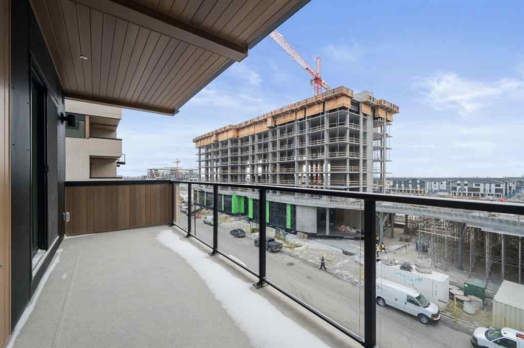 MLS® A2249981 - Unit #402 8370 Broadcast Avenue SW in West Springs Calgary, Residential