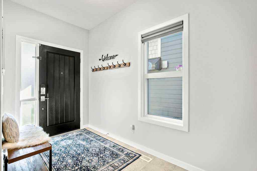 MLS® A2250002 - 55 Sundown Way  in Sunset Ridge Cochrane, Residential
