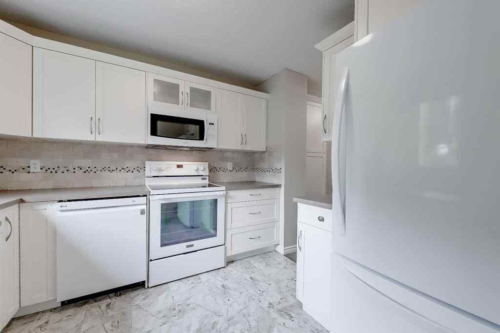 MLS® A2250006 - Unit #26 219 90 Avenue SE in Acadia Calgary, Residential