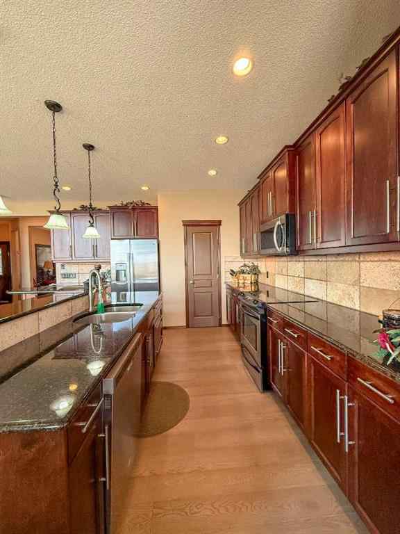 MLS® A2250010 - 128 Chaparral Valley Drive SE in Chaparral Calgary, Residential