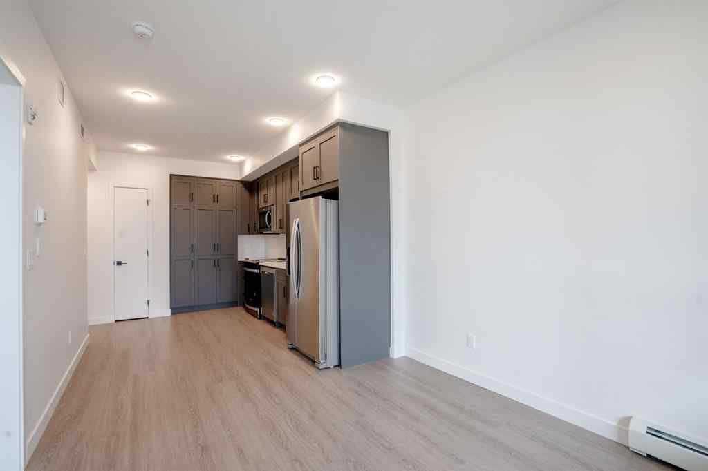 MLS® A2250018 - Unit #418 3932 University Avenue NW in University District Calgary, Residential