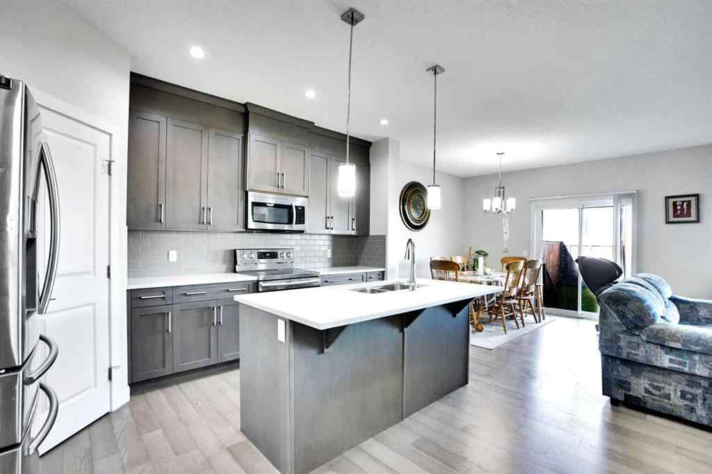 MLS® A2250021 - 99 Savanna Way NE in Saddle Ridge Calgary, Residential