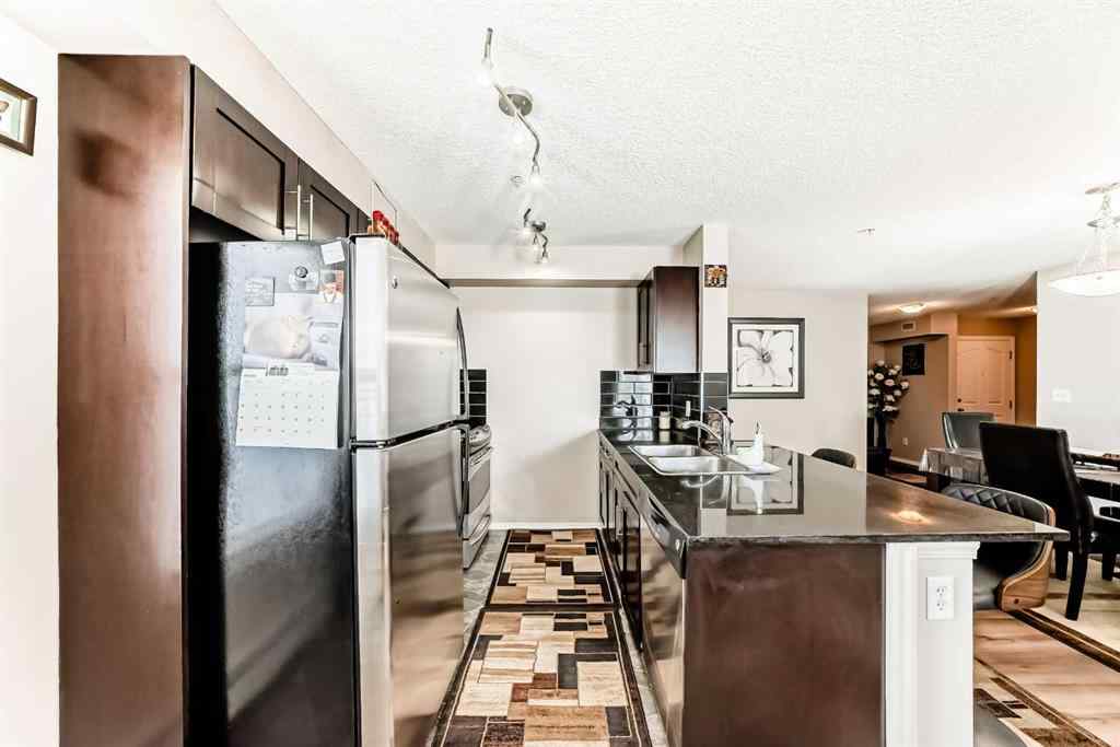 MLS® A2250022 - Unit #218 7130 80 Avenue NE in Saddle Ridge Calgary, Residential