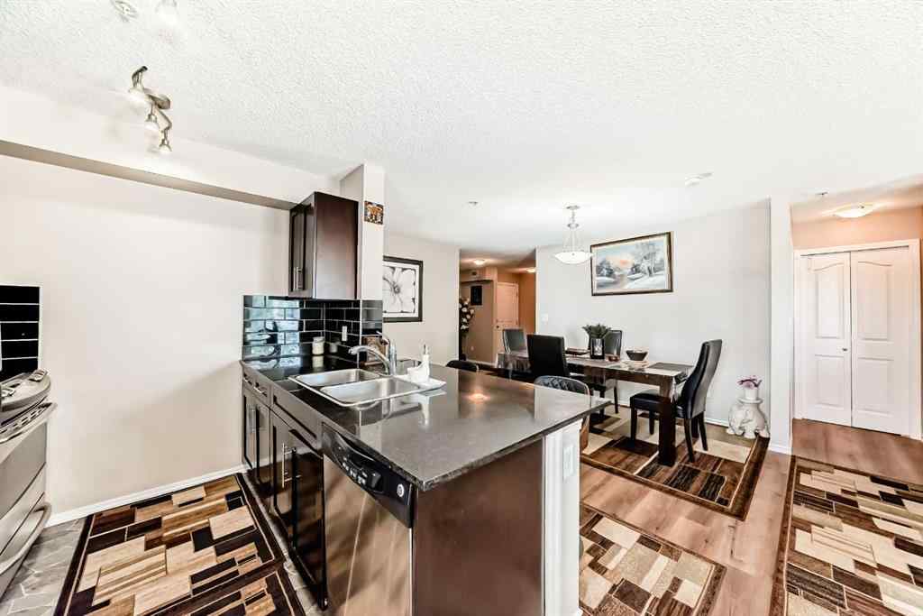 MLS® A2250022 - Unit #218 7130 80 Avenue NE in Saddle Ridge Calgary, Residential