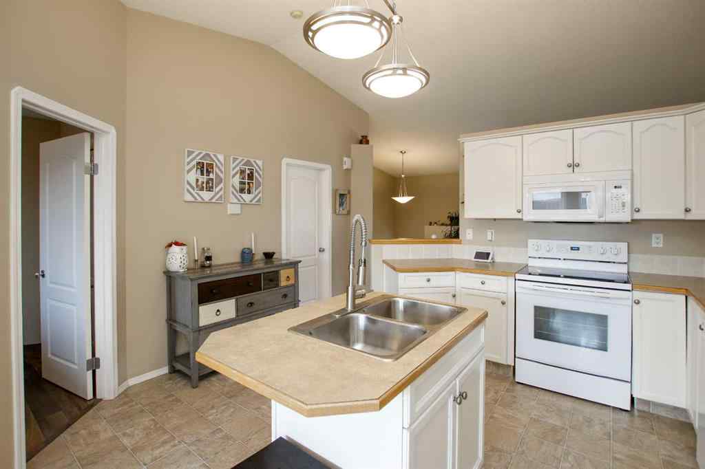 MLS® A2250029 - 13 Kenny Close  in Kentwood West Red Deer, Residential