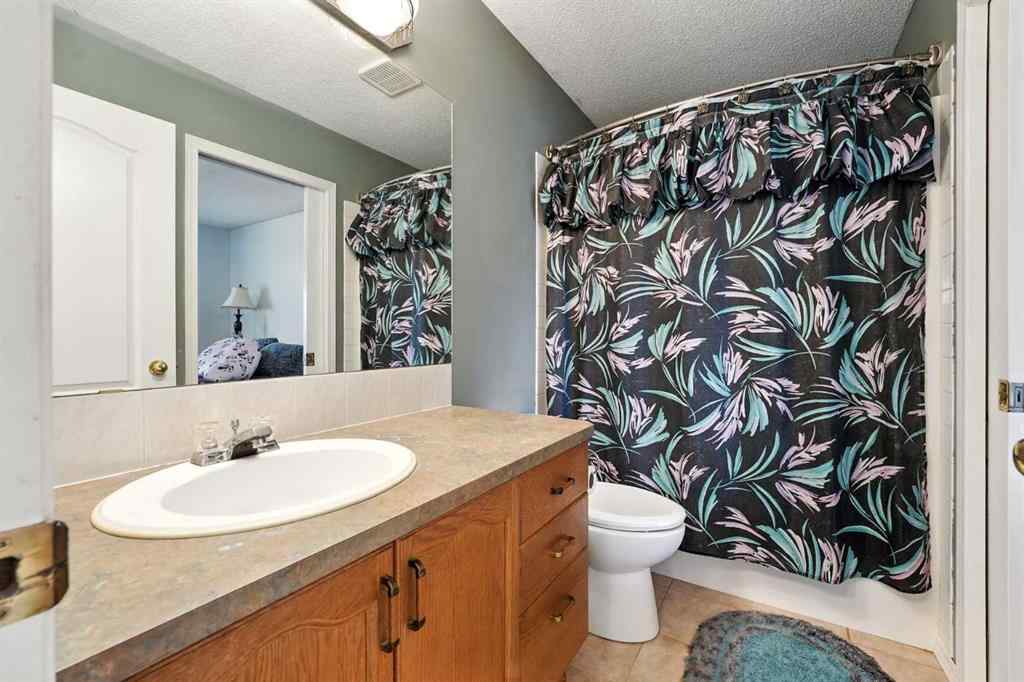 MLS® A2250044 - 26 Bridlewood Way SW in Bridlewood Calgary, Residential