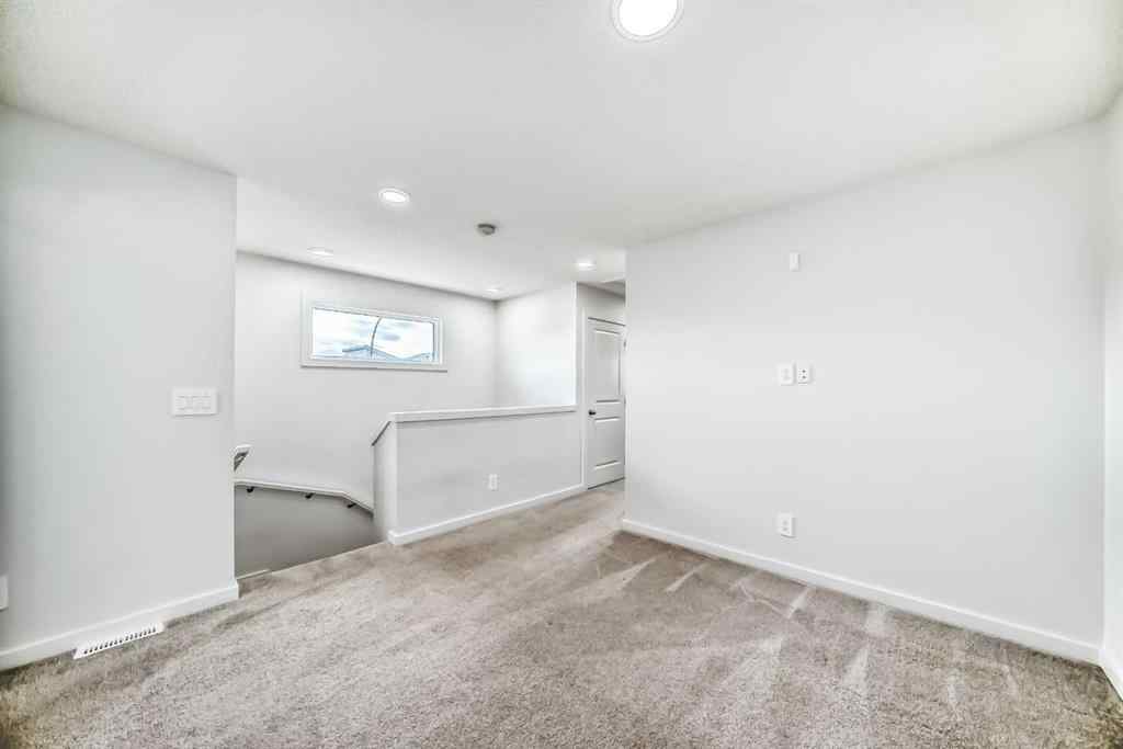 MLS® A2250046 - 197 Belmont Drive SW in Belmont Calgary, Residential