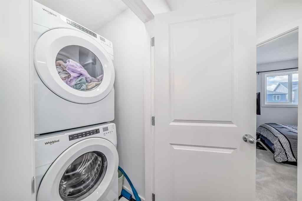 MLS® A2250046 - 197 Belmont Drive SW in Belmont Calgary, Residential