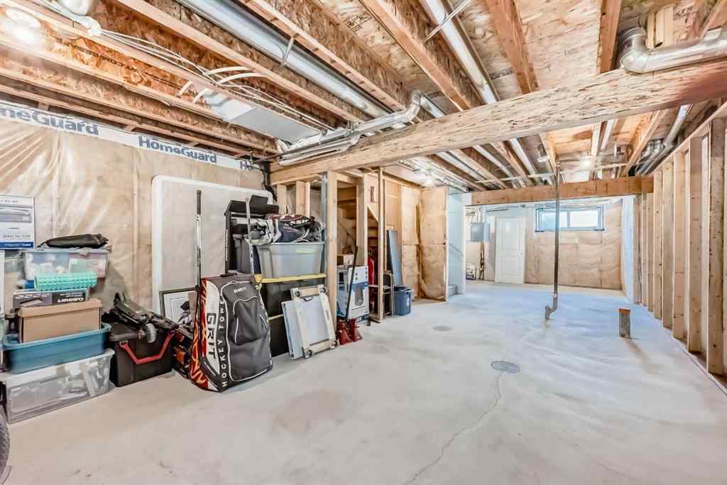 MLS® A2250046 - 197 Belmont Drive SW in Belmont Calgary, Residential