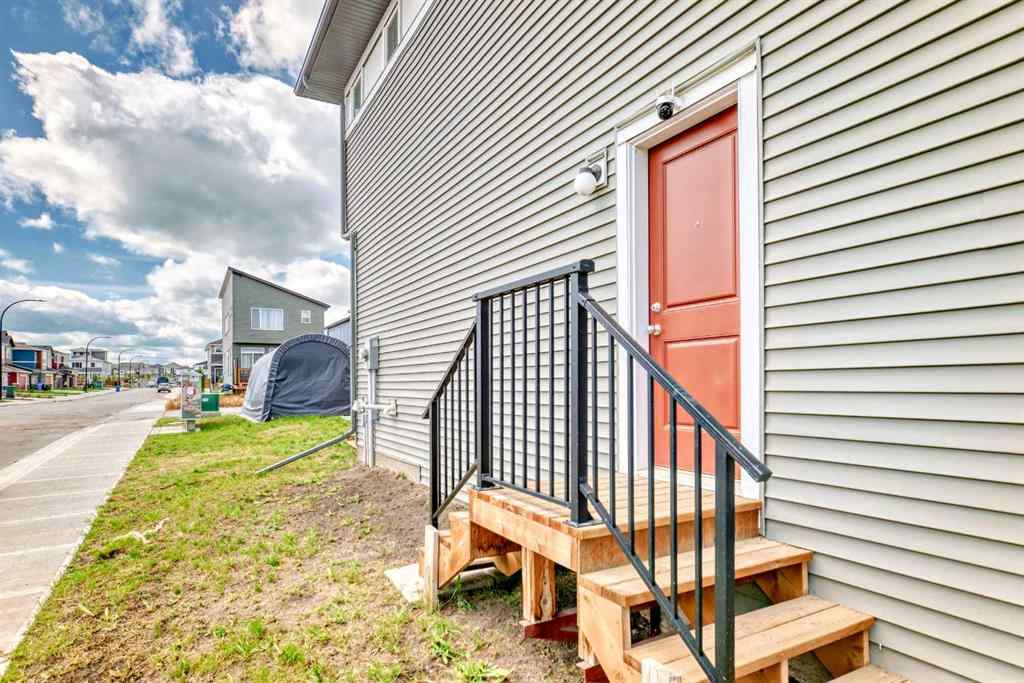 MLS® A2250046 - 197 Belmont Drive SW in Belmont Calgary, Residential