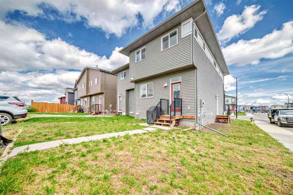 MLS® A2250046 - 197 Belmont Drive SW in Belmont Calgary, Residential