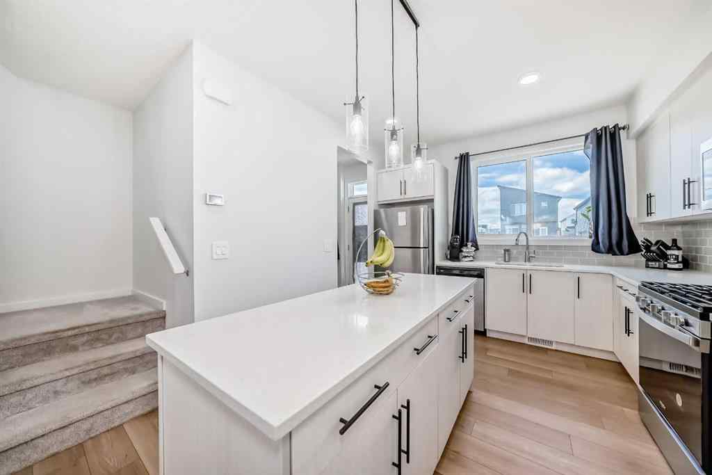MLS® A2250046 - 197 Belmont Drive SW in Belmont Calgary, Residential