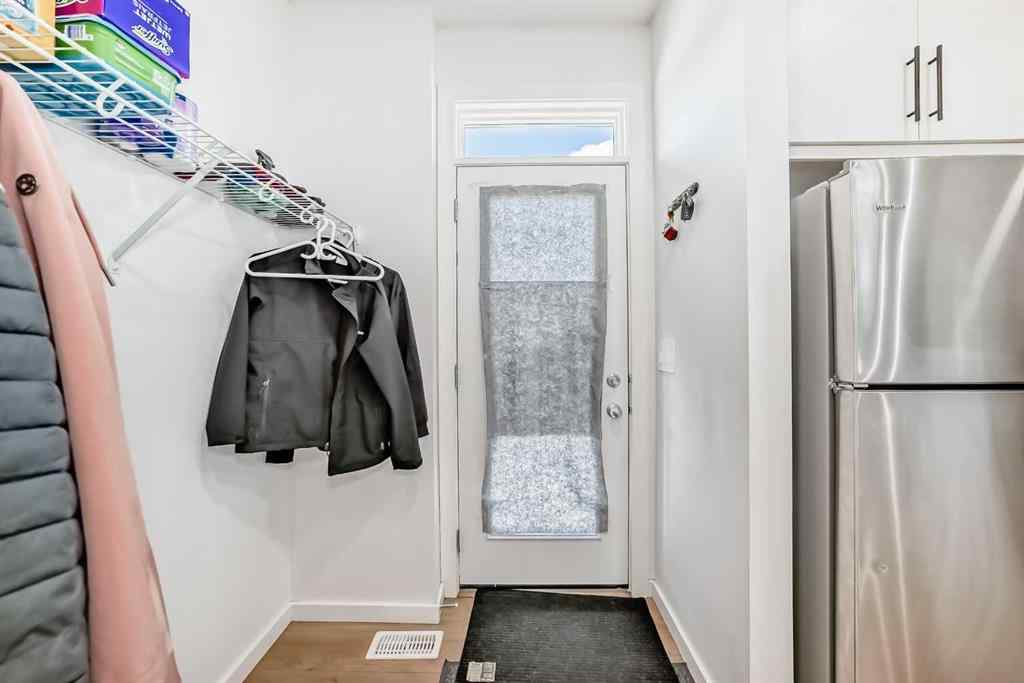 MLS® A2250046 - 197 Belmont Drive SW in Belmont Calgary, Residential
