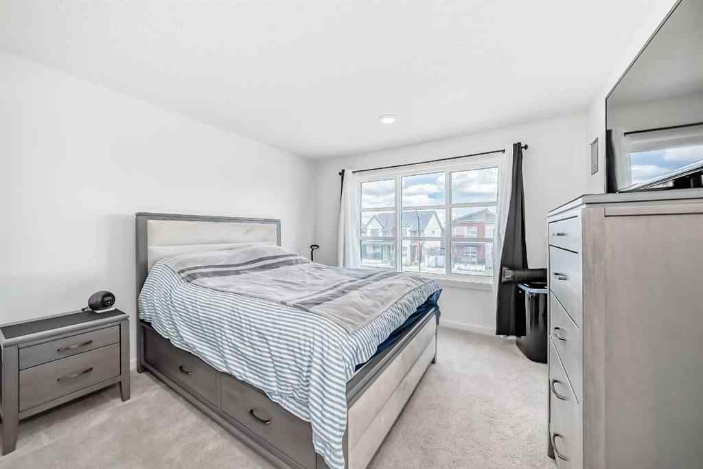 MLS® A2250046 - 197 Belmont Drive SW in Belmont Calgary, Residential
