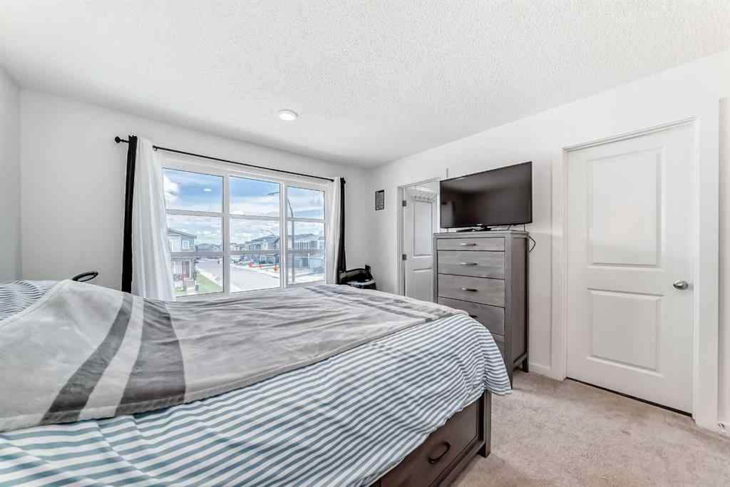 MLS® A2250046 - 197 Belmont Drive SW in Belmont Calgary, Residential