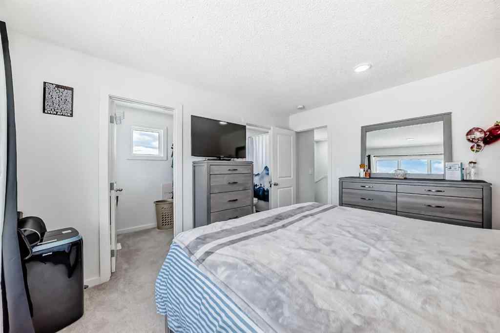 MLS® A2250046 - 197 Belmont Drive SW in Belmont Calgary, Residential