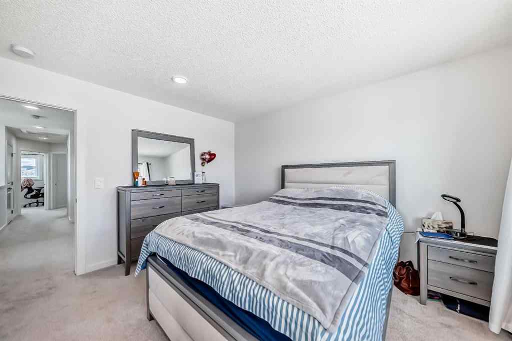 MLS® A2250046 - 197 Belmont Drive SW in Belmont Calgary, Residential