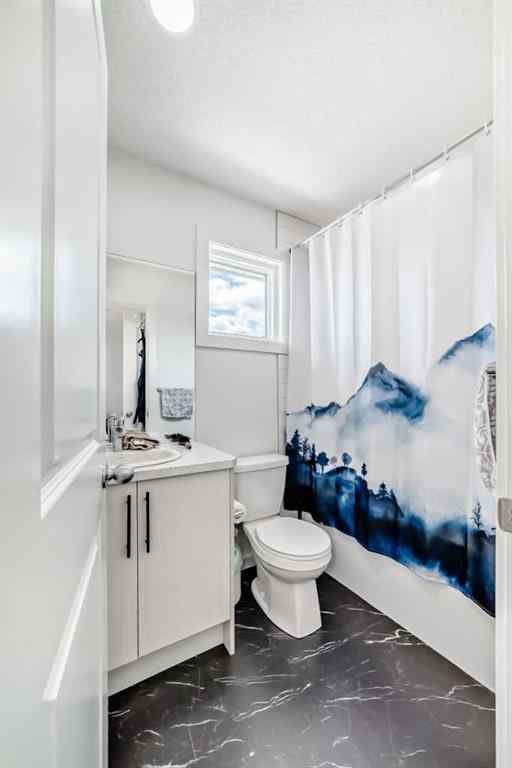 MLS® A2250046 - 197 Belmont Drive SW in Belmont Calgary, Residential