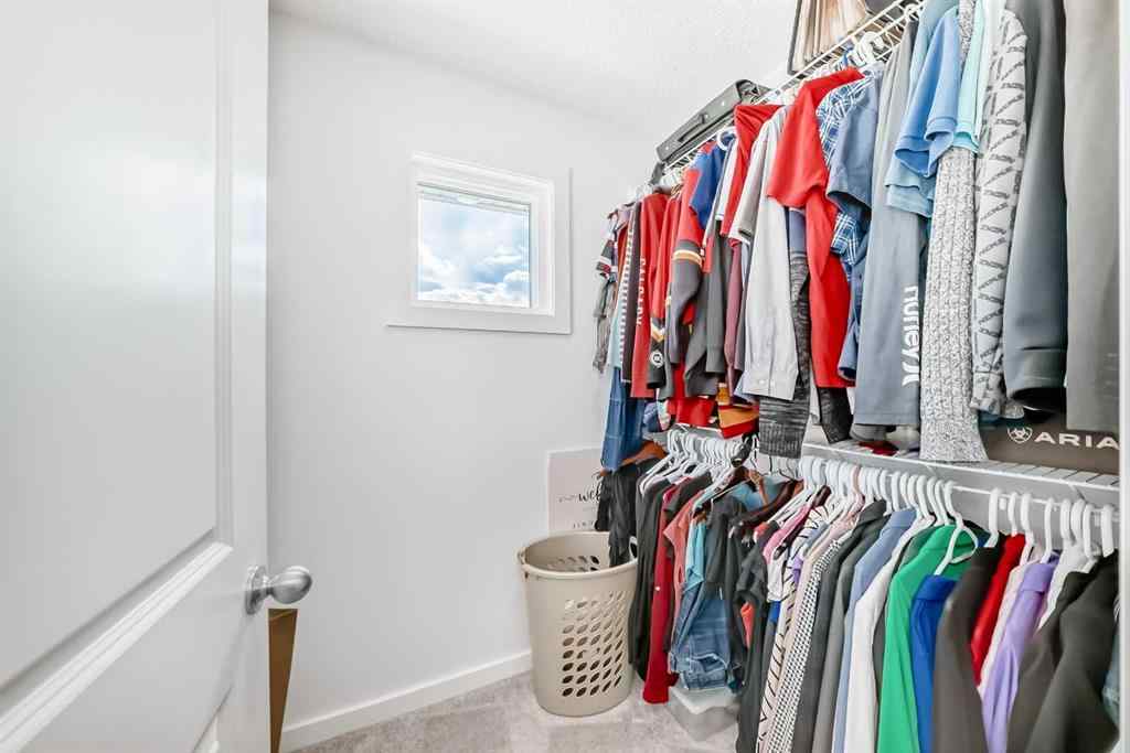MLS® A2250046 - 197 Belmont Drive SW in Belmont Calgary, Residential