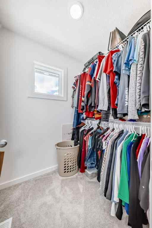 MLS® A2250046 - 197 Belmont Drive SW in Belmont Calgary, Residential