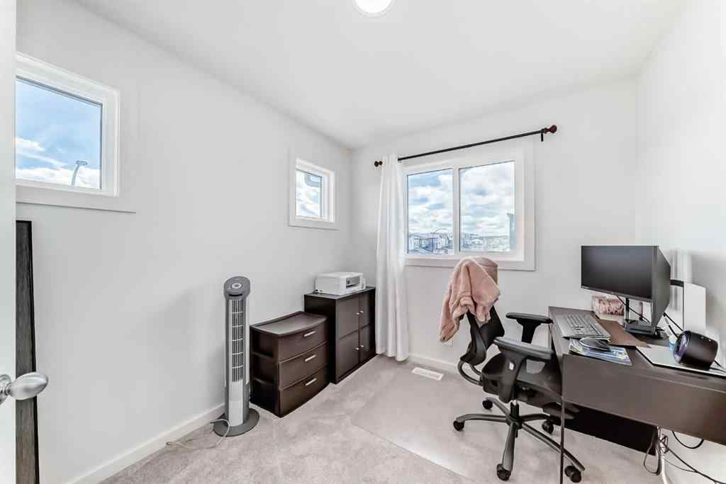 MLS® A2250046 - 197 Belmont Drive SW in Belmont Calgary, Residential