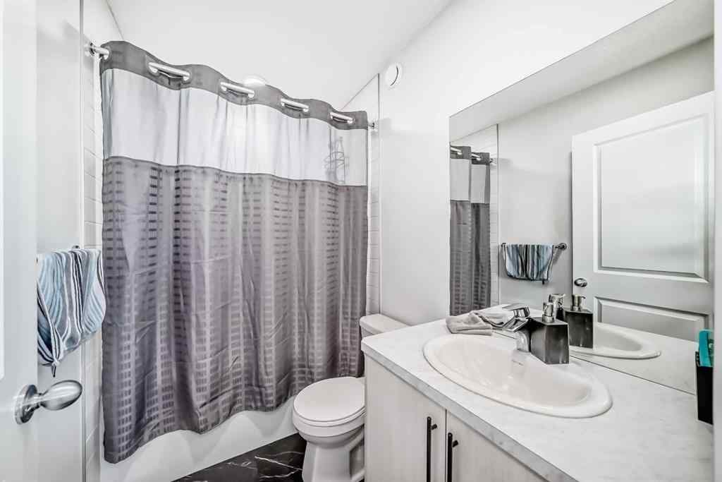MLS® A2250046 - 197 Belmont Drive SW in Belmont Calgary, Residential