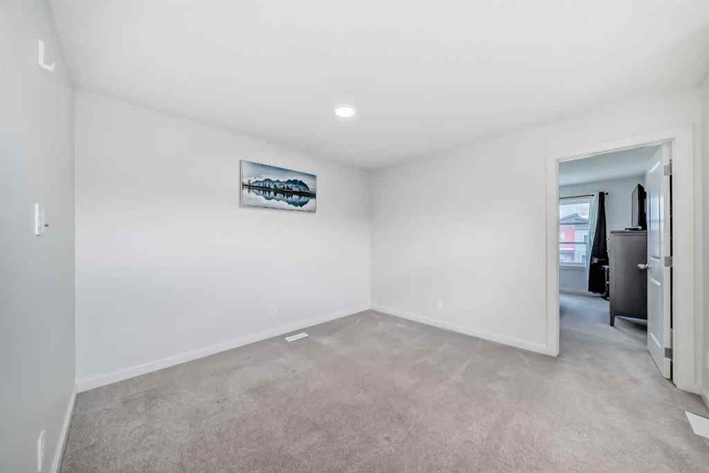 MLS® A2250046 - 197 Belmont Drive SW in Belmont Calgary, Residential